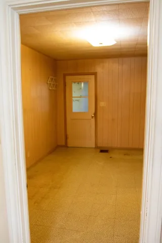a bathroom with a shower and a sink
