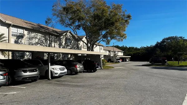a view of a cars park in front of house