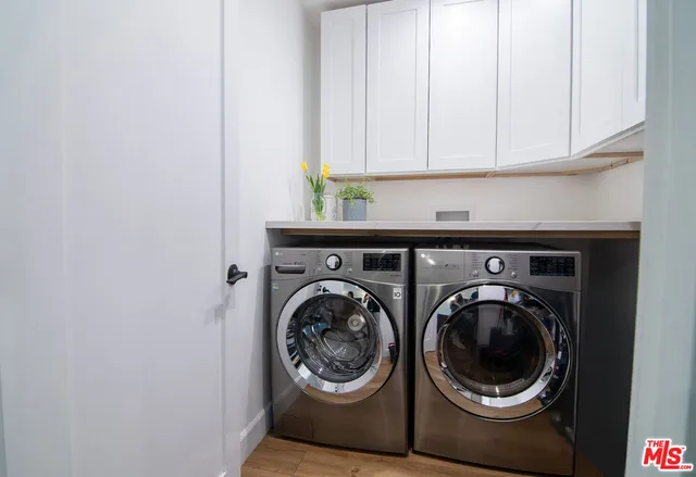 a view of a chairs and table in the garden