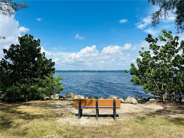 a front view of a building with garden
