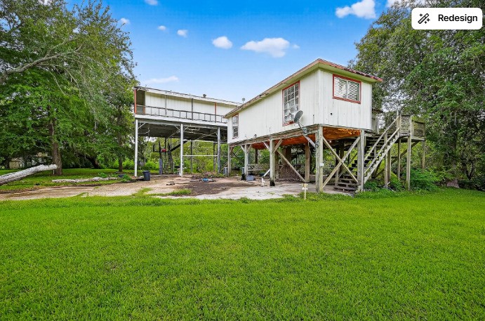 523-525 Shady Oaks Harbor Road Alvin, TX 77511 - Photo 3 of 23 a view of a house with a yard
