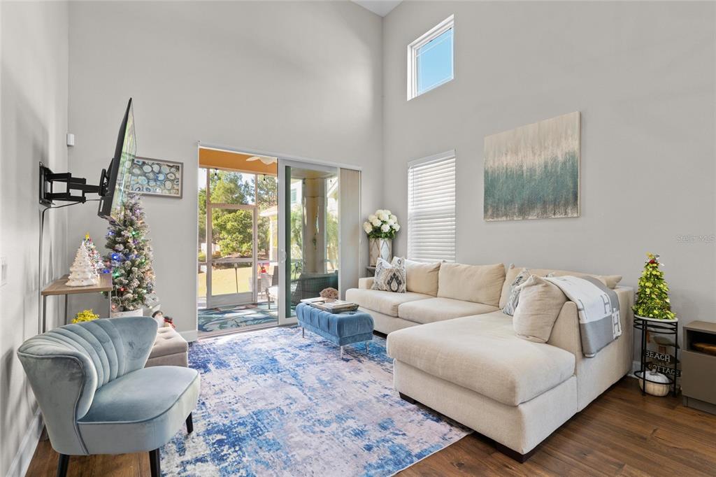 1444 Ridge Terrace Tarpon Springs, FL 34689 - Photo 13 of 30 a living room with furniture and a large window