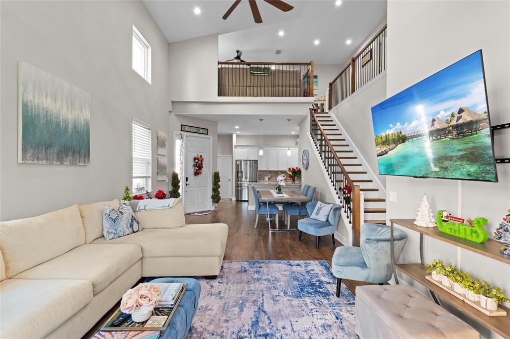 1444 Ridge Terrace Tarpon Springs, FL 34689 - Photo 14 of 30 a living room with furniture and a flat screen tv