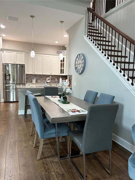 1444 Ridge Terrace Tarpon Springs, FL 34689 - Photo 15 of 30 a view of a dining room with furniture