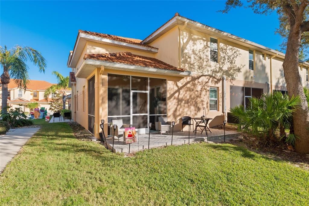1444 Ridge Terrace Tarpon Springs, FL 34689 - Photo 3 of 30 a view of a house with backyard porch and sitting area