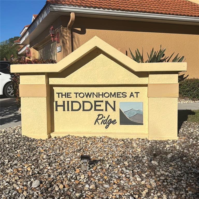 1444 Ridge Terrace Tarpon Springs, FL 34689 - Photo 5 of 30 a sign that is on the side of the road