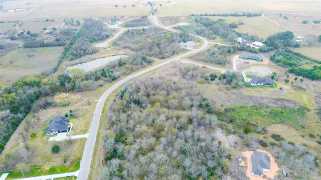 a view of a wooden floor with a lake view
