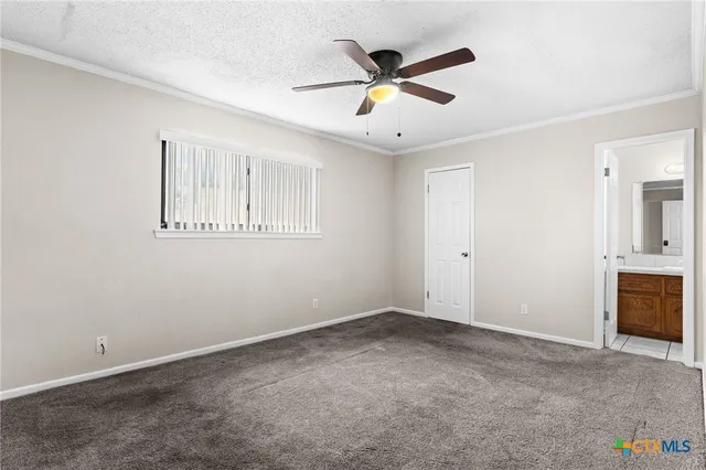 a view of an empty room with window