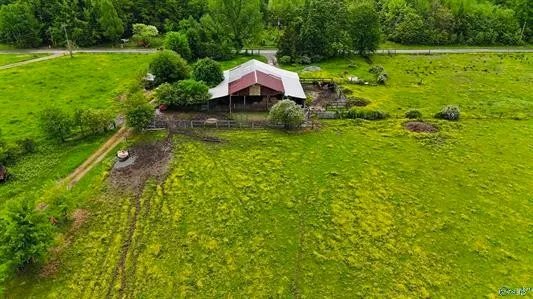 a house view with a garden space