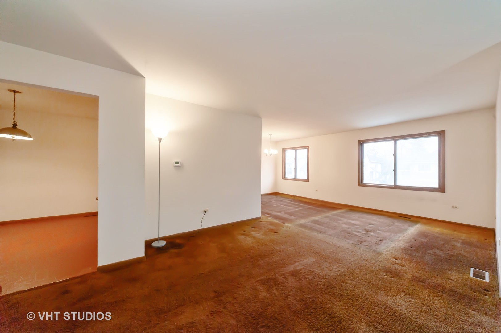 1485 Chippewa Trail Wheeling, IL 60090 - Photo 4 of 20 an empty room with windows