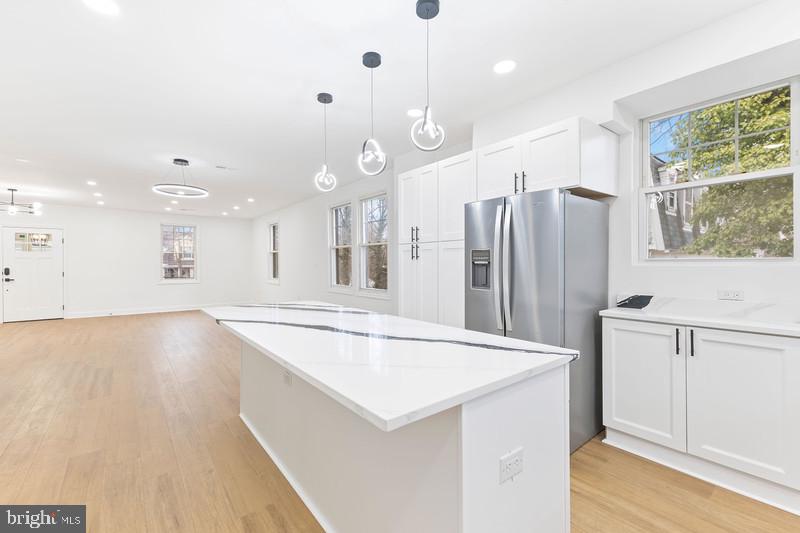2016 32nd Street Southeast Washington, DC 20020 - Photo 9 of 24 Gourmet Kitchen with a Breakfast Bar