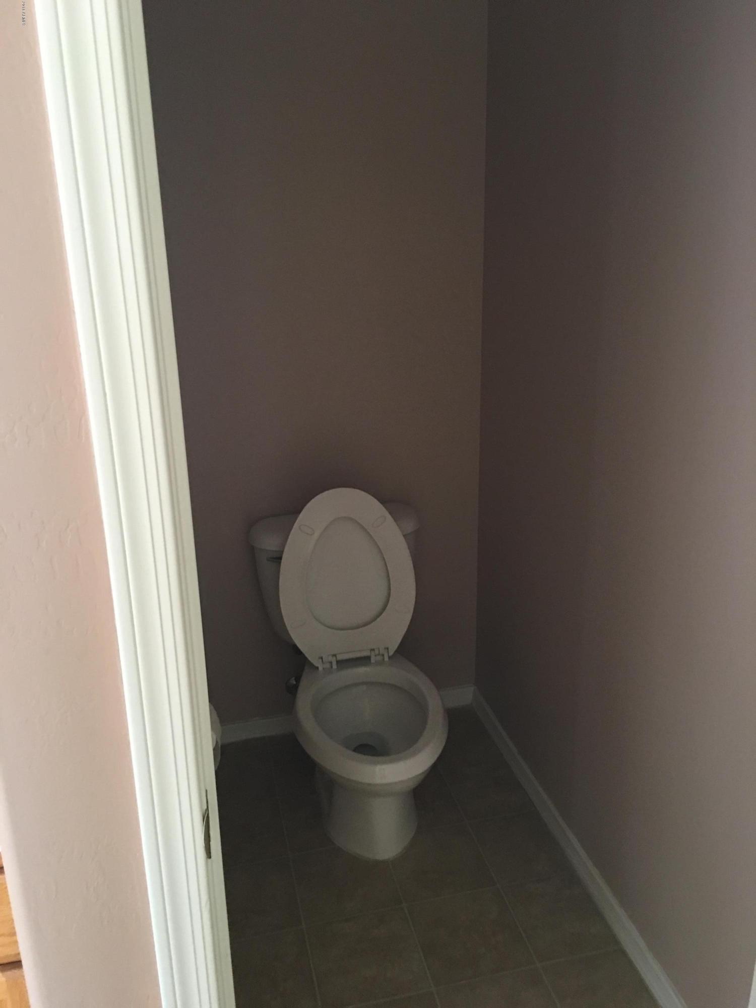 905 East Beverly Road Phoenix, AZ 85042 - Photo 22 of 35 Private toilet room