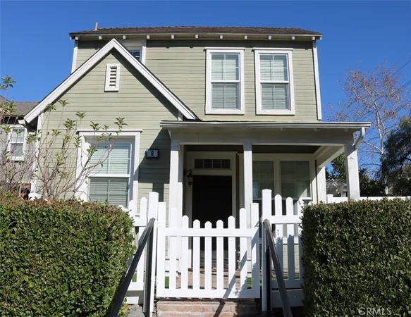 front view of a house with a small yard