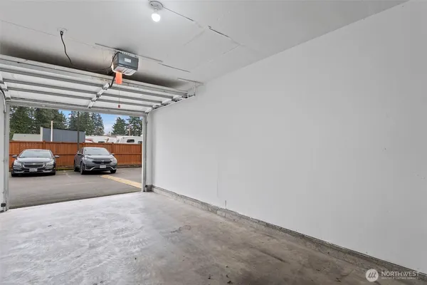 a view of garage and yard