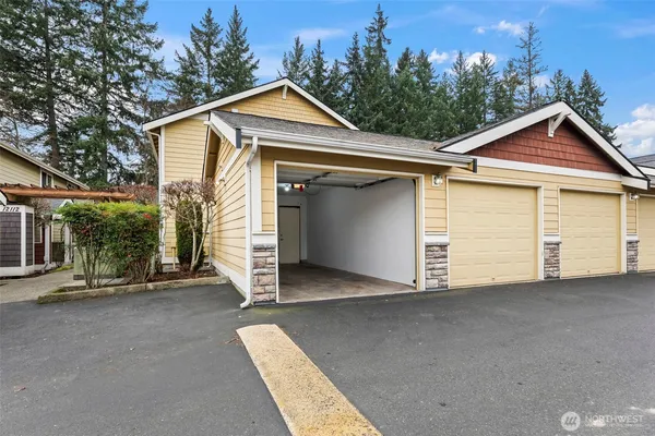 a view of a house with a garage