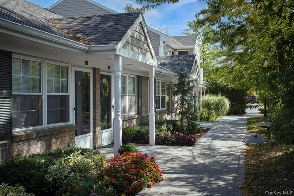 a view of a house with a garden