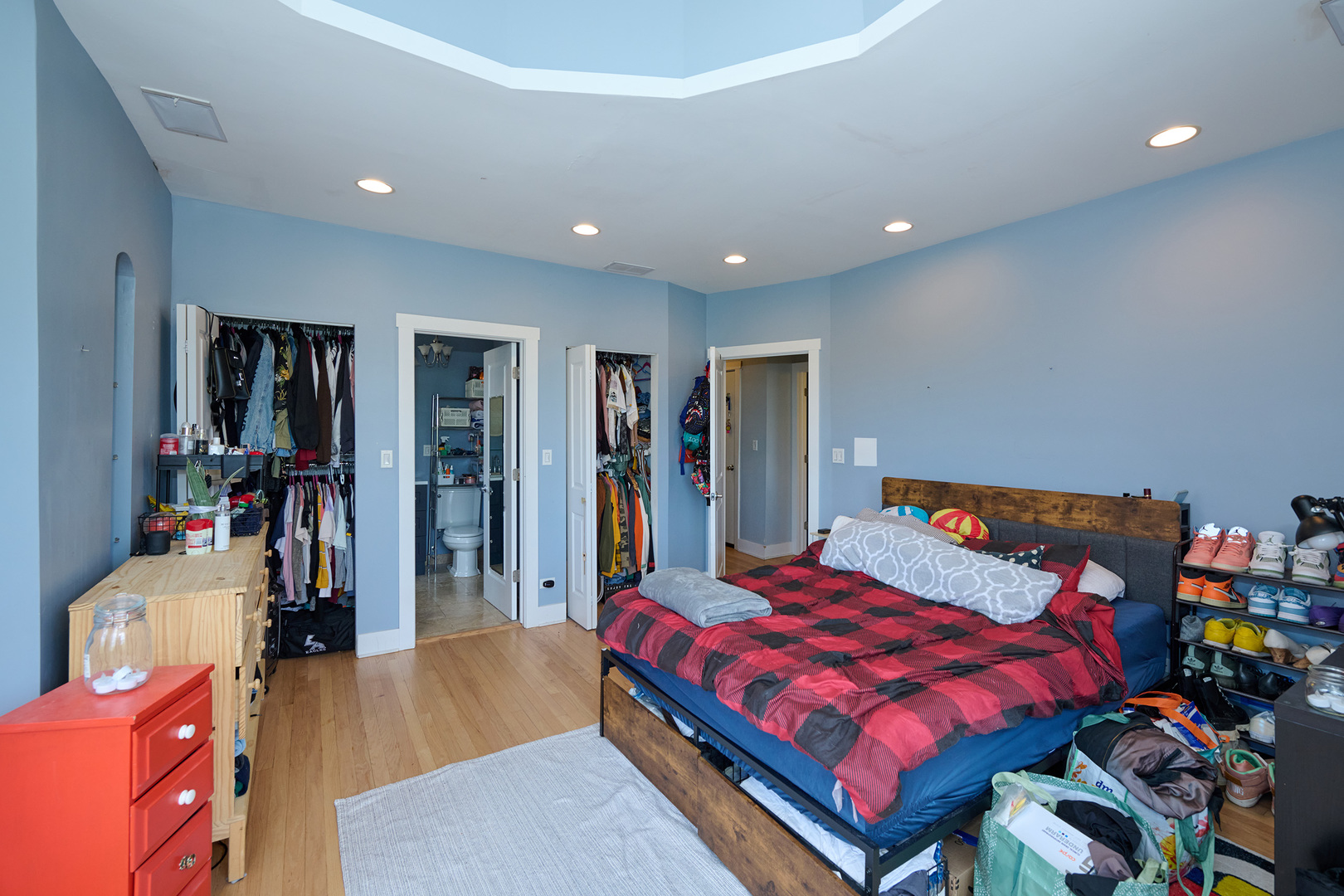 5711 North Kimball Avenue, Unit 3N Chicago, IL 60659 - Photo 16 of 24 a bed room with a bed and a walk in closet