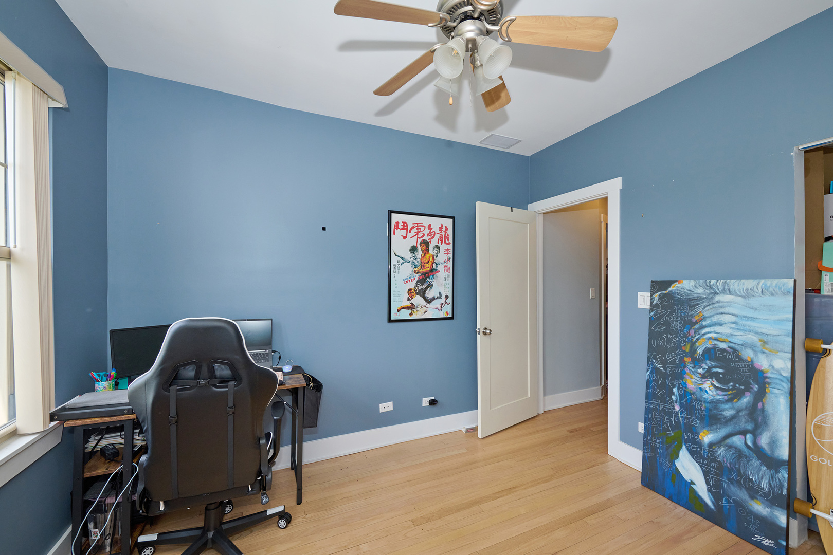 5711 North Kimball Avenue, Unit 3N Chicago, IL 60659 - Photo 20 of 24 a view of a workspace with furniture and a window