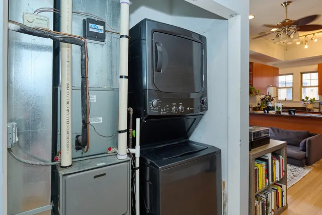 a bedroom with bed and a window