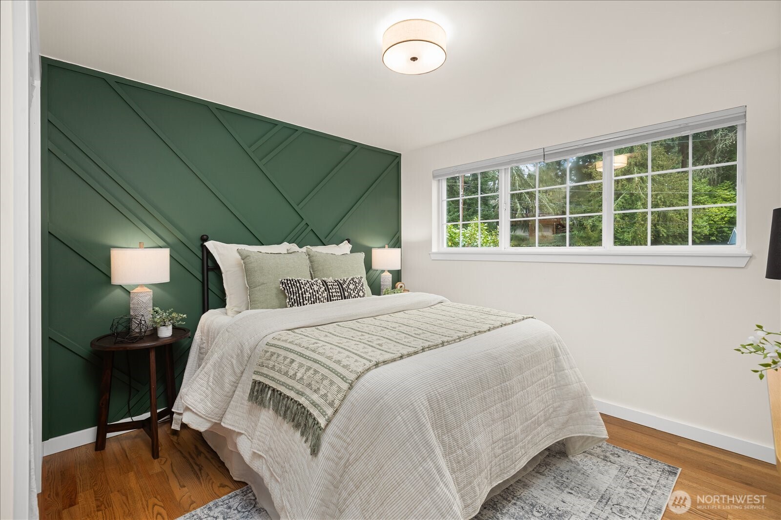 23409 94th Place West Edmonds, WA 98020 - Photo 18 of 39 a bedroom with a bed and a window