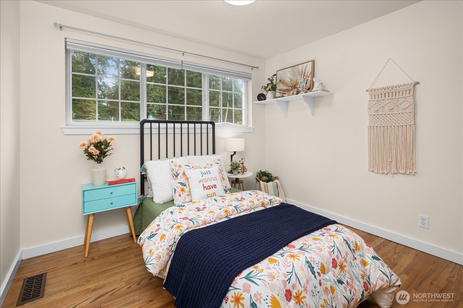 23409 94th Place West Edmonds, WA 98020 - Photo 19 of 39 a bedroom with a bed and a window
