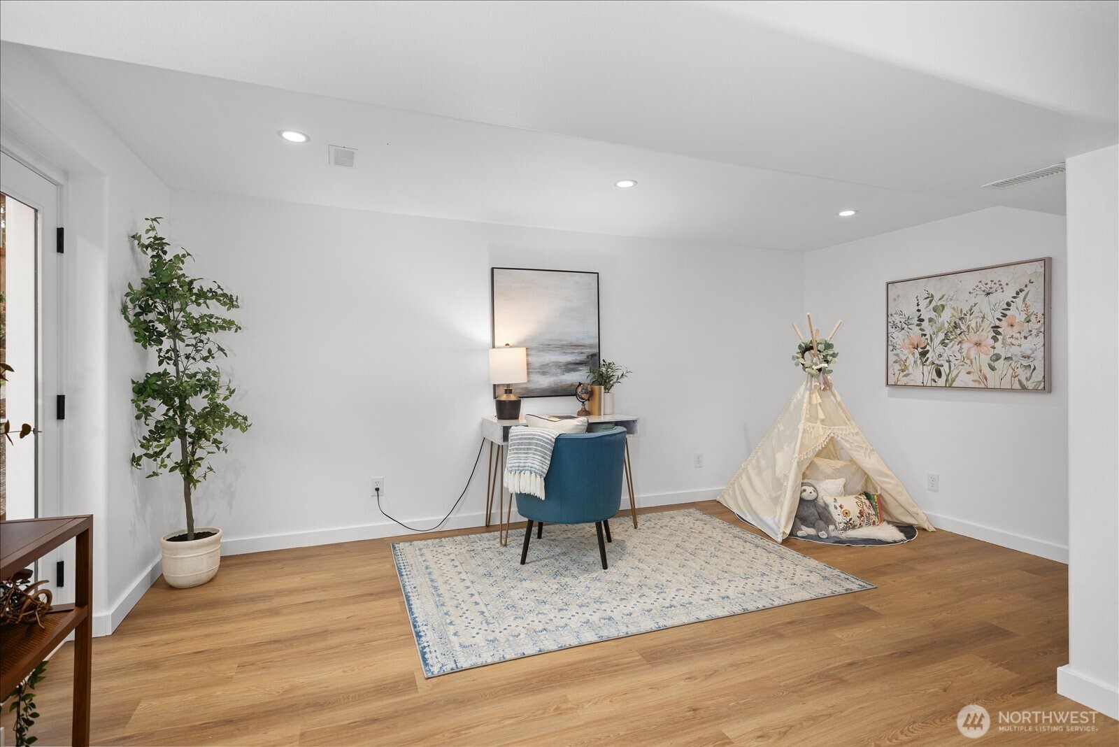 23409 94th Place West Edmonds, WA 98020 - Photo 25 of 39 a living room with furniture and wooden floor