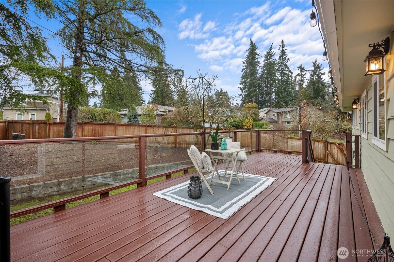 23409 94th Place West Edmonds, WA 98020 - Photo 29 of 39 a view of a patio with a table and chairs
