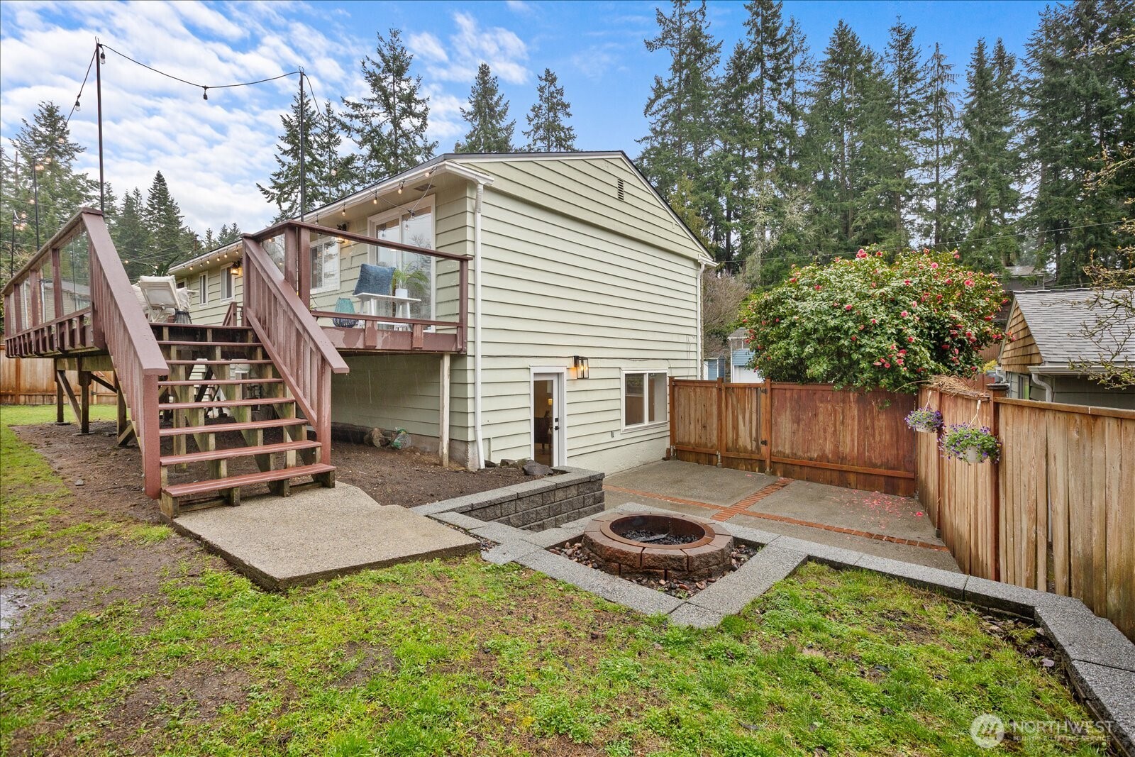 23409 94th Place West Edmonds, WA 98020 - Photo 31 of 39 a view of a house with backyard and trees