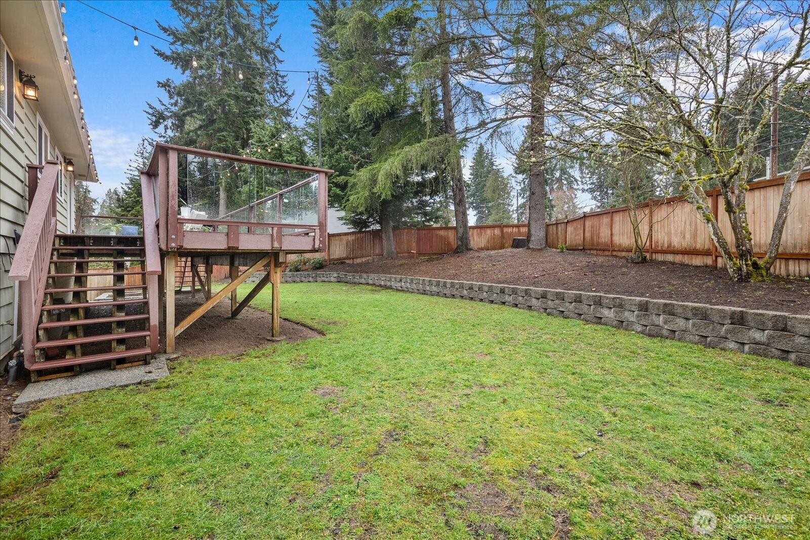 23409 94th Place West Edmonds, WA 98020 - Photo 32 of 39 a view of a backyard with a slide