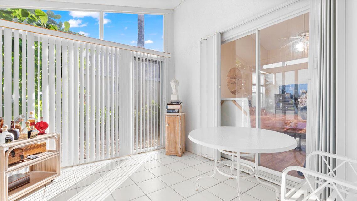 7961 Mansfield Hollow Road Delray Beach, FL 33446 - Photo 3 of 19 a bathroom with a sink toilet and a shower