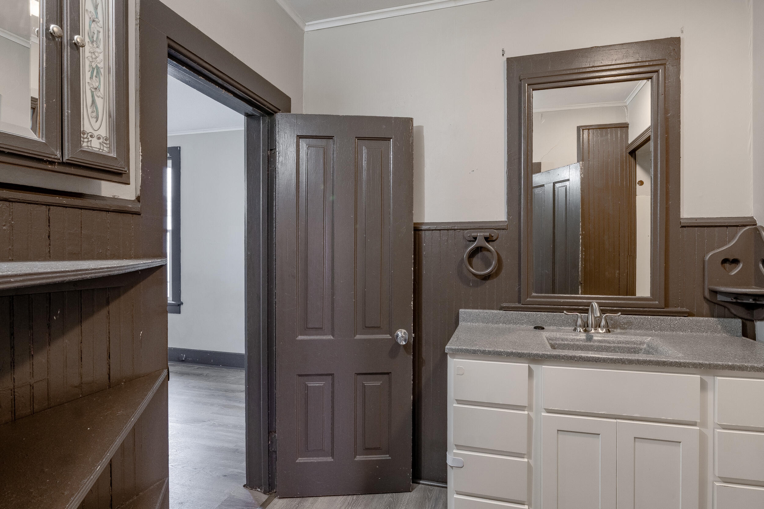 403 Rose Street La Porte, IN 46350 - Photo 21 of 28 a bathroom with a sink and a mirror
