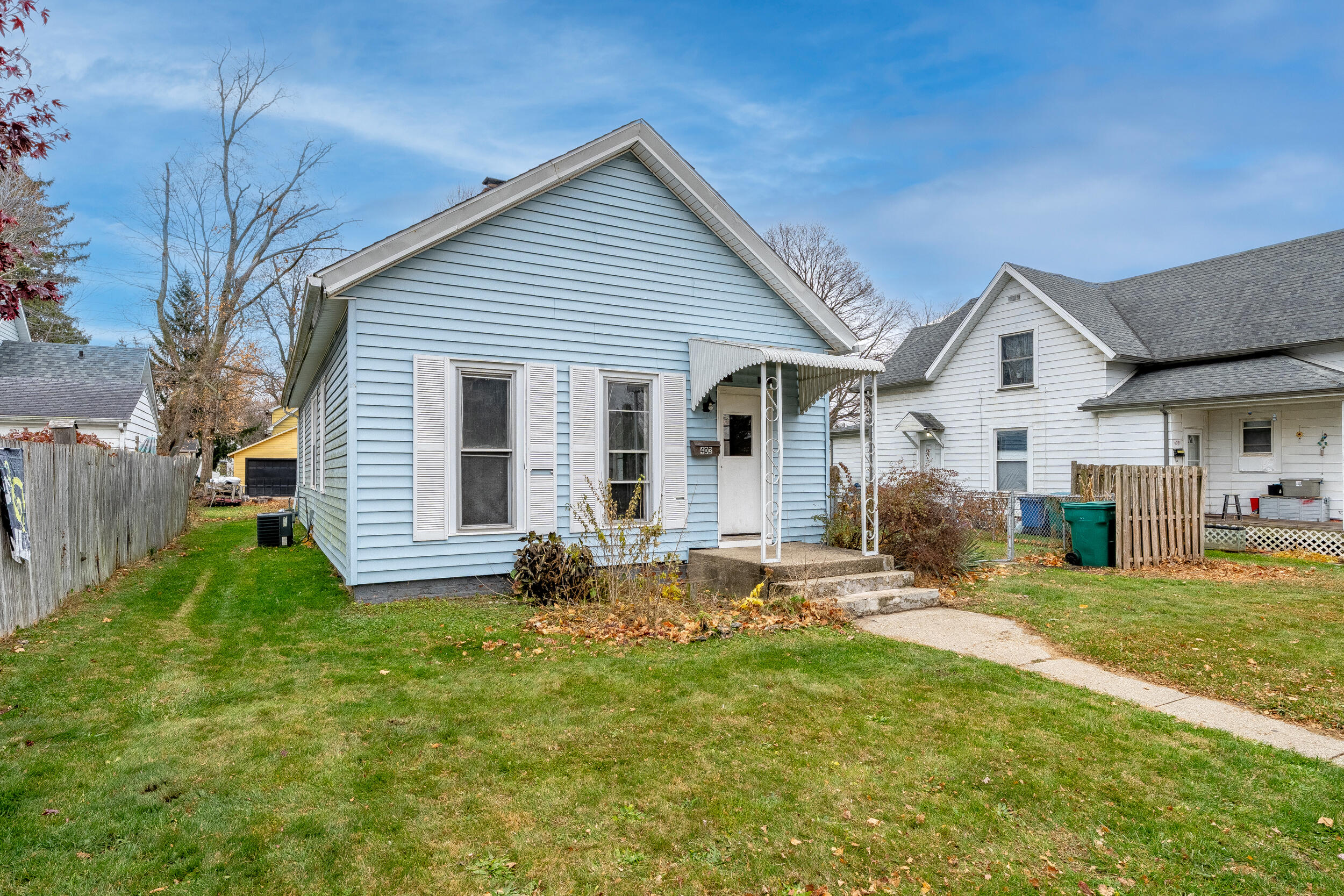 403 Rose Street La Porte, IN 46350 - Photo 3 of 28 a front view of house with yard and green space