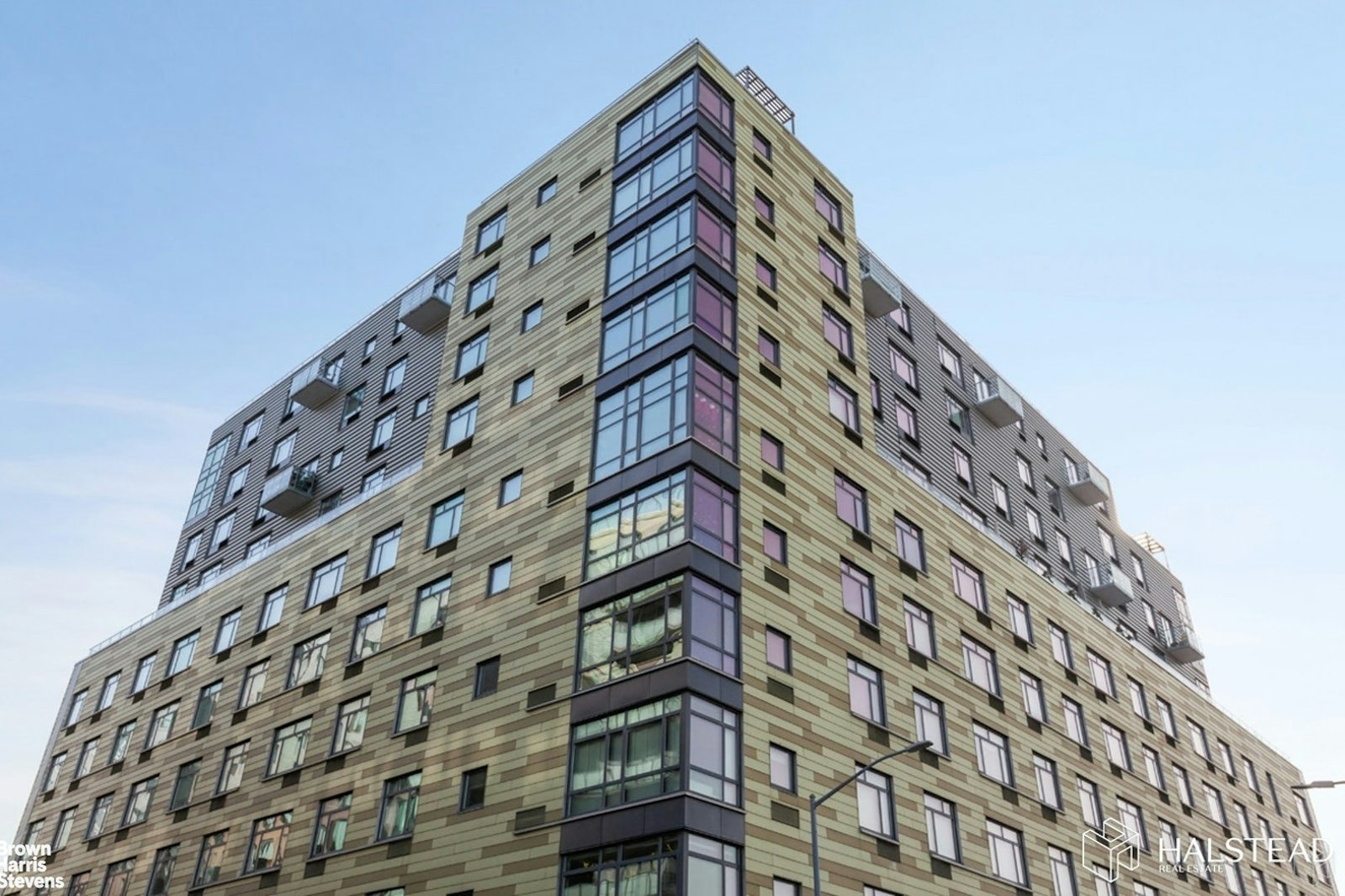 11-02 49th Avenue, Unit 8A Queens, NY 11101 - Photo 33 of 36 a view of a tall building