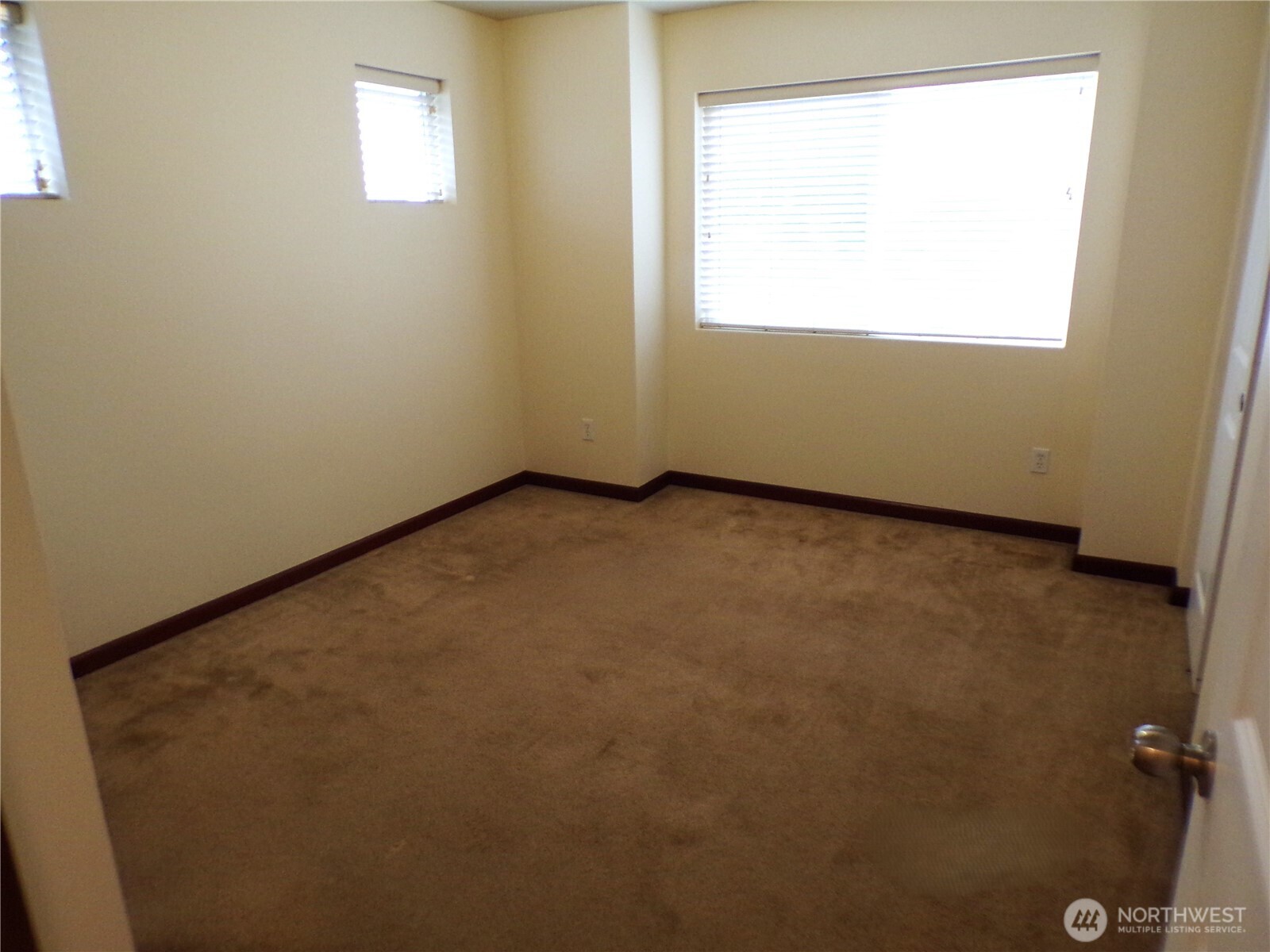 501 North 105th Street, Unit A Seattle, WA 98133 - Photo 18 of 39 an empty room with a window