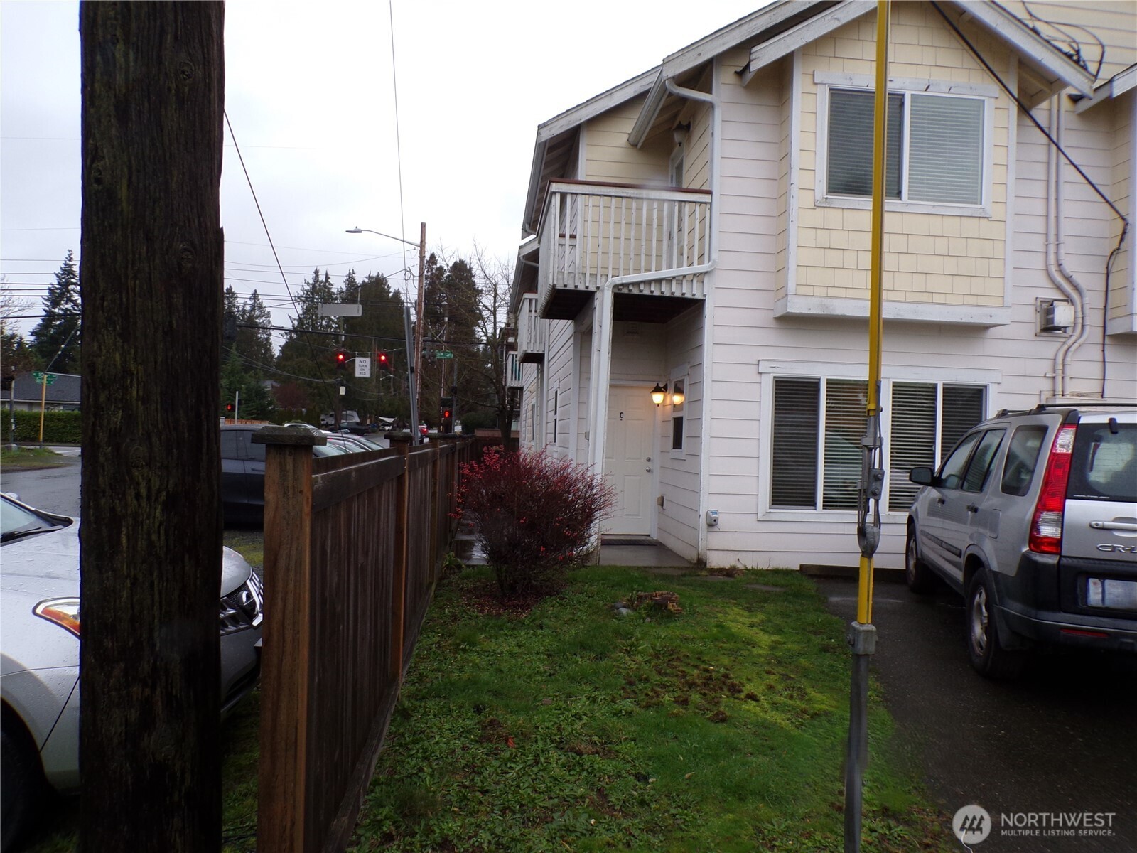 501 North 105th Street, Unit A Seattle, WA 98133 - Photo 33 of 39 a view of a house with backyard and porch
