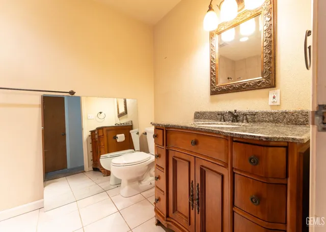 a bathroom with a bath tub with a shower