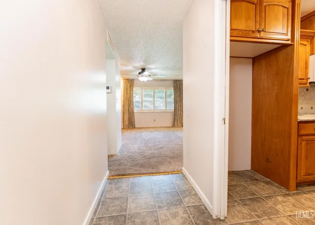 a kitchen with stainless steel appliances a sink and cabinets