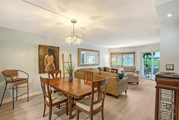 a living room with fireplace furniture and a flat screen tv