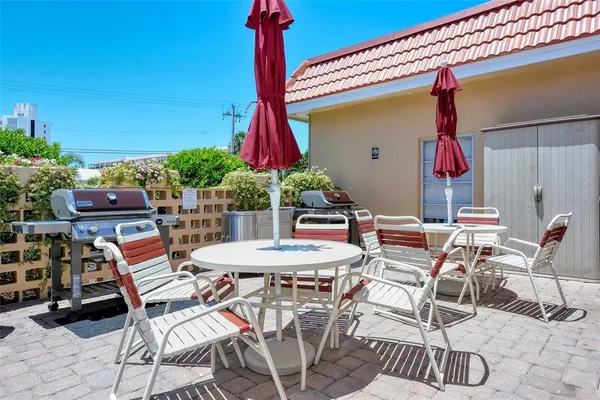 a view of outdoor space with seating yard and hardwood