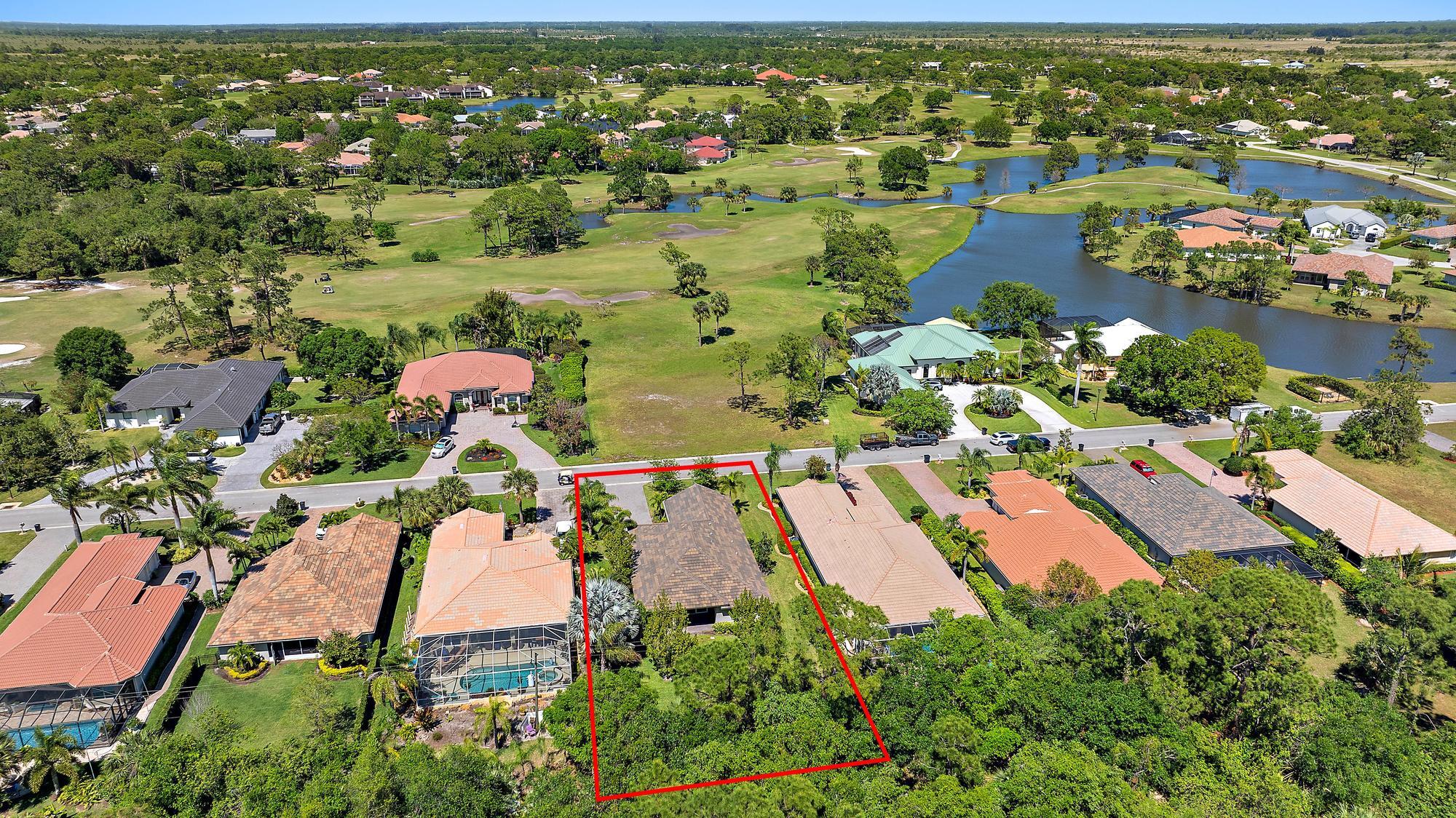 2664 Conifer Drive Fort Pierce, FL 34951 - Photo 21 of 30 an aerial view of residential houses with outdoor space