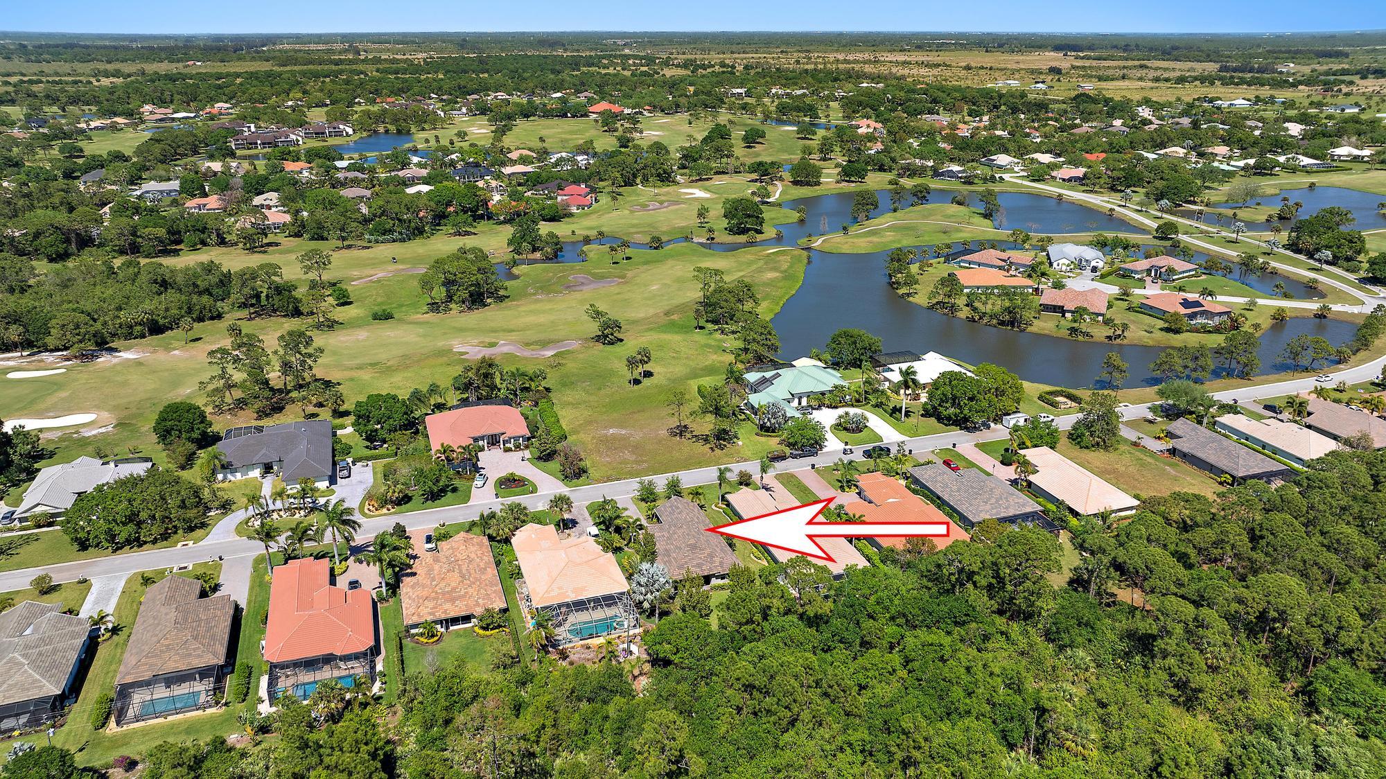 2664 Conifer Drive Fort Pierce, FL 34951 - Photo 22 of 30 an aerial view of residential houses with outdoor space