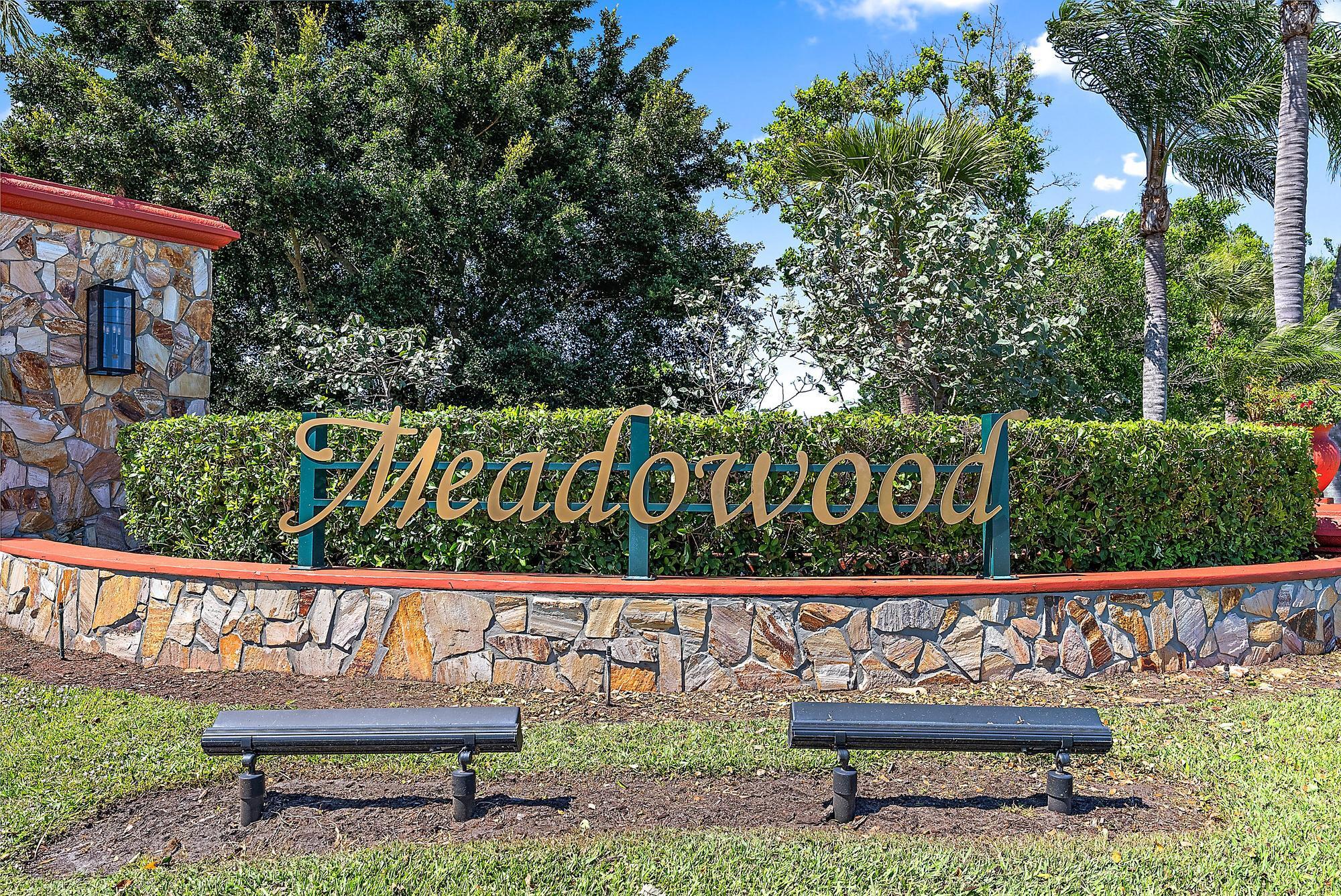 2664 Conifer Drive Fort Pierce, FL 34951 - Photo 3 of 30 a wooden bench sitting in front of a building