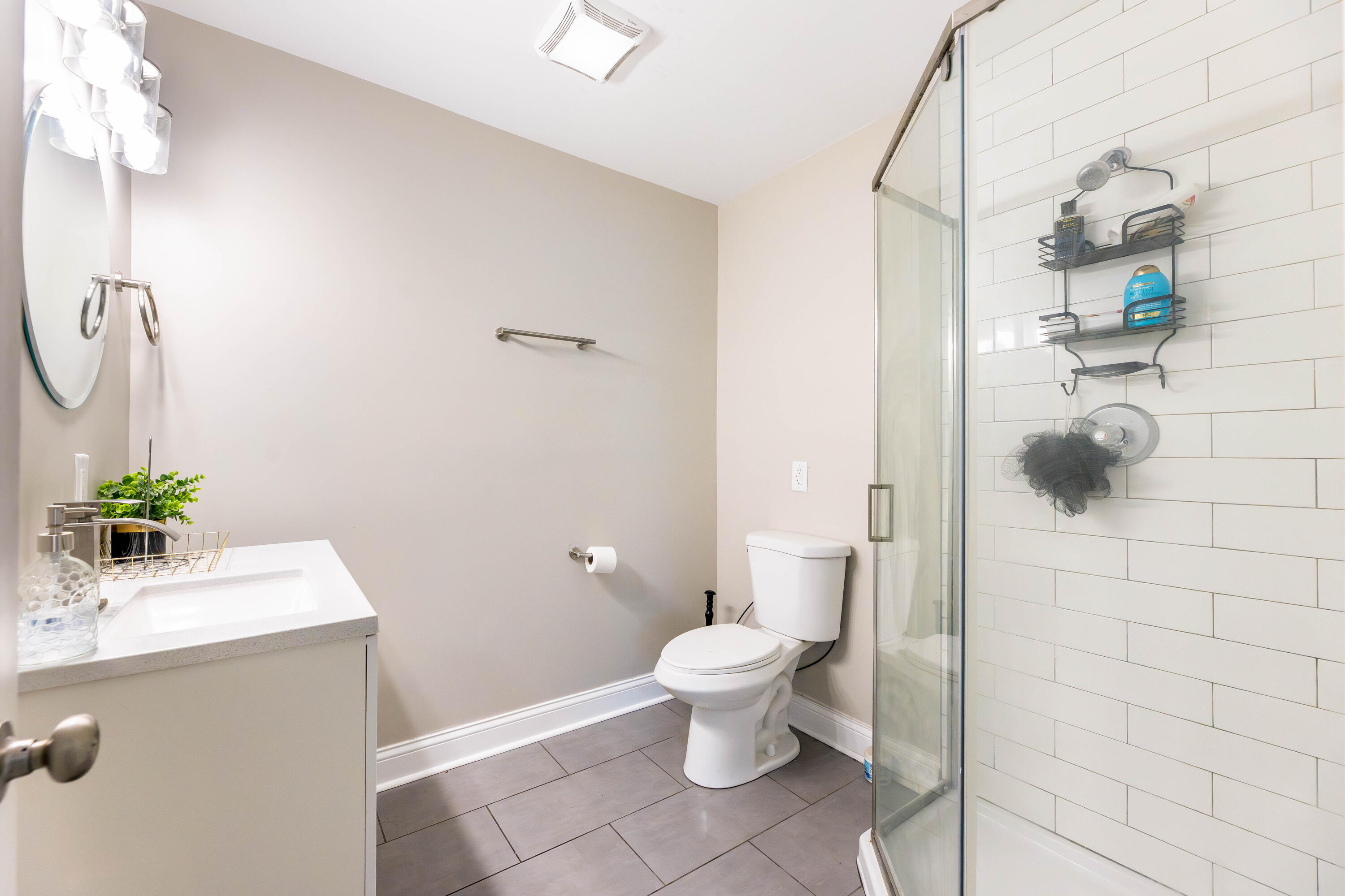1151 Benton Street Gary, IN 46403 - Photo 11 of 23 a bathroom with a sink mirror and toilet