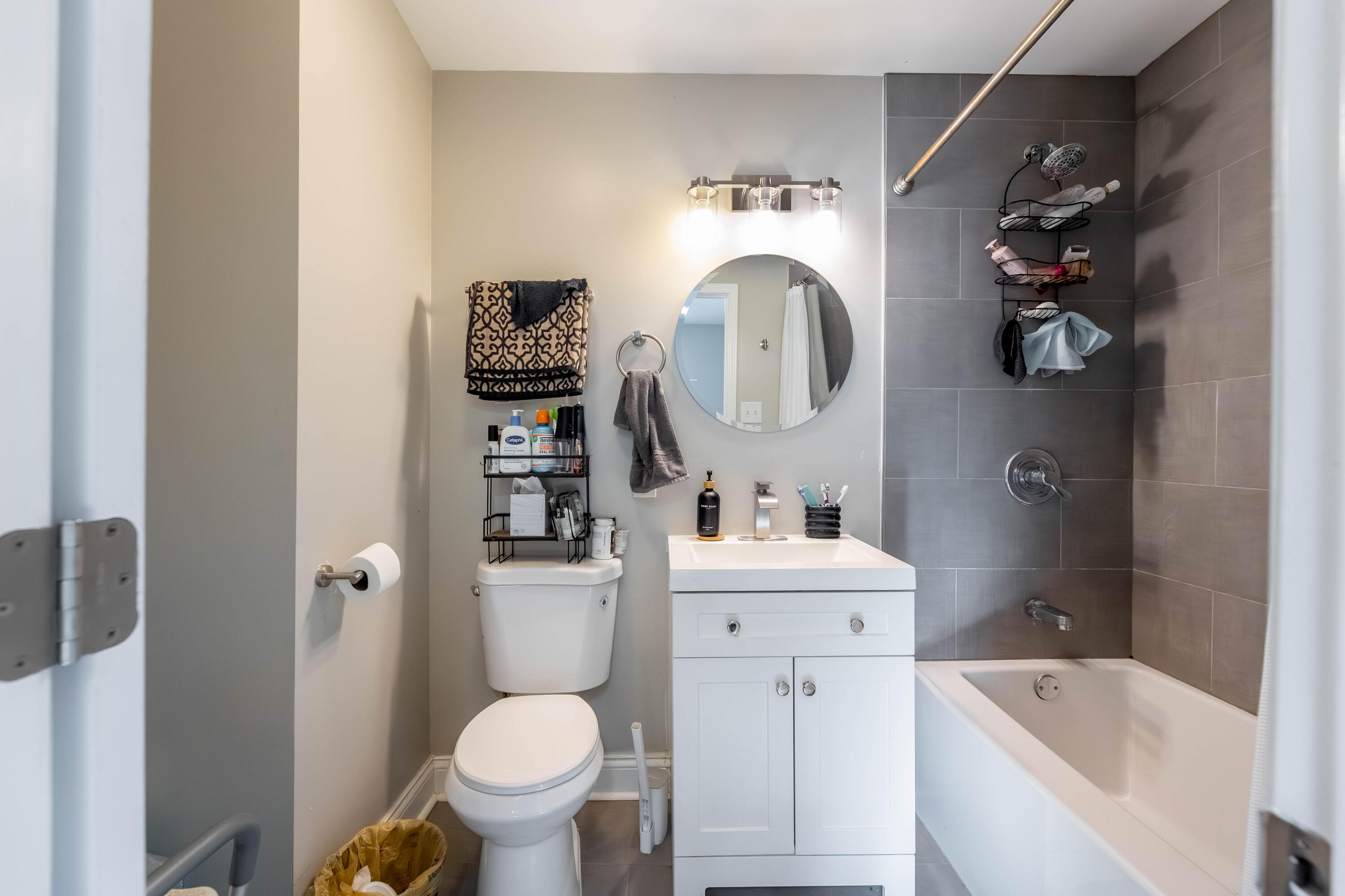 1151 Benton Street Gary, IN 46403 - Photo 15 of 23 a bathroom with a toilet sink and mirror