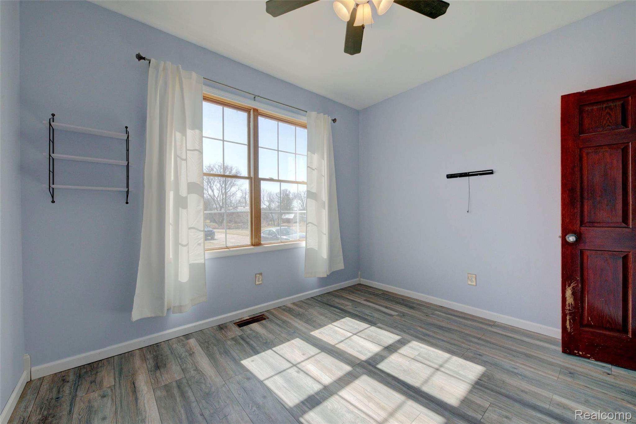 1888 North Briggsville Road Fowlerville, MI 48836 - Photo 33 of 44 Huge Front Bedroom Window.jpg