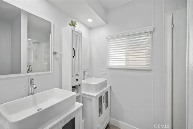 a bathroom with a sink and a bathtub