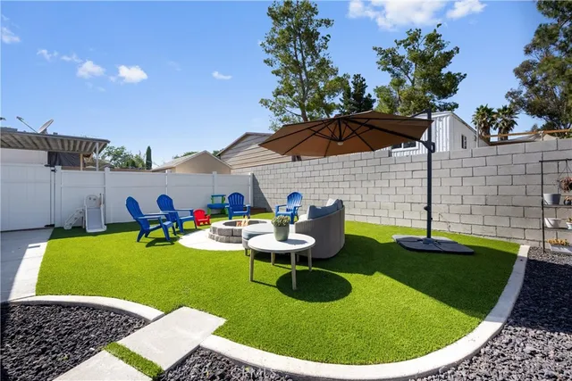 a view of a swimming pool with lounge chairs