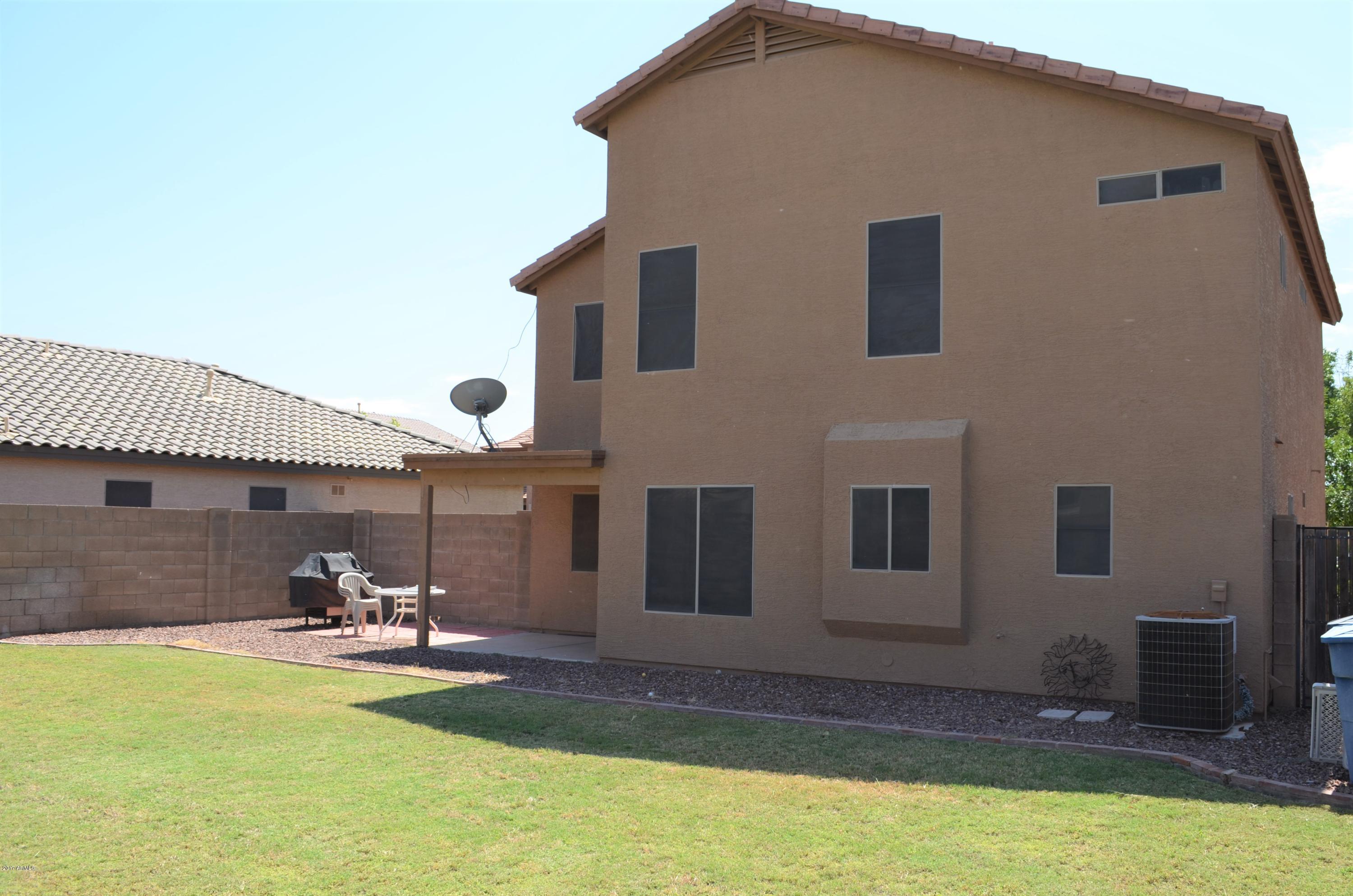 1742 East Del Rio Street Gilbert, AZ 85295 - Photo 16 of 28 a view of a backyard with furniture