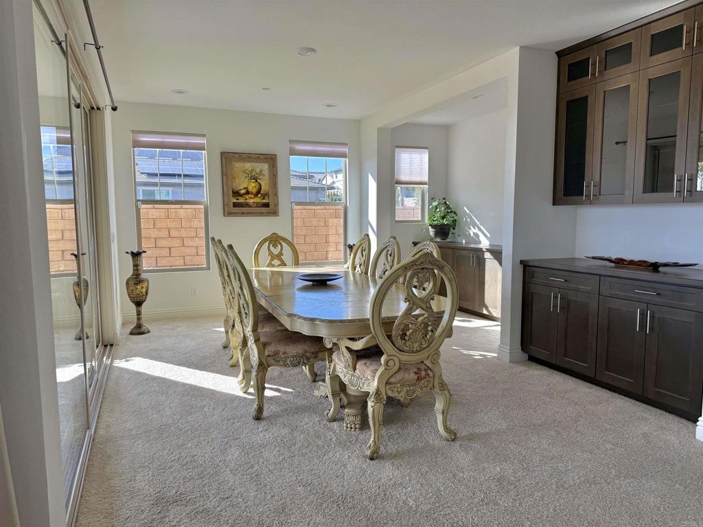39529 Dayspring Way Temecula, CA 92591 - Photo 13 of 49 a view of a dining room with furniture and a chandelier