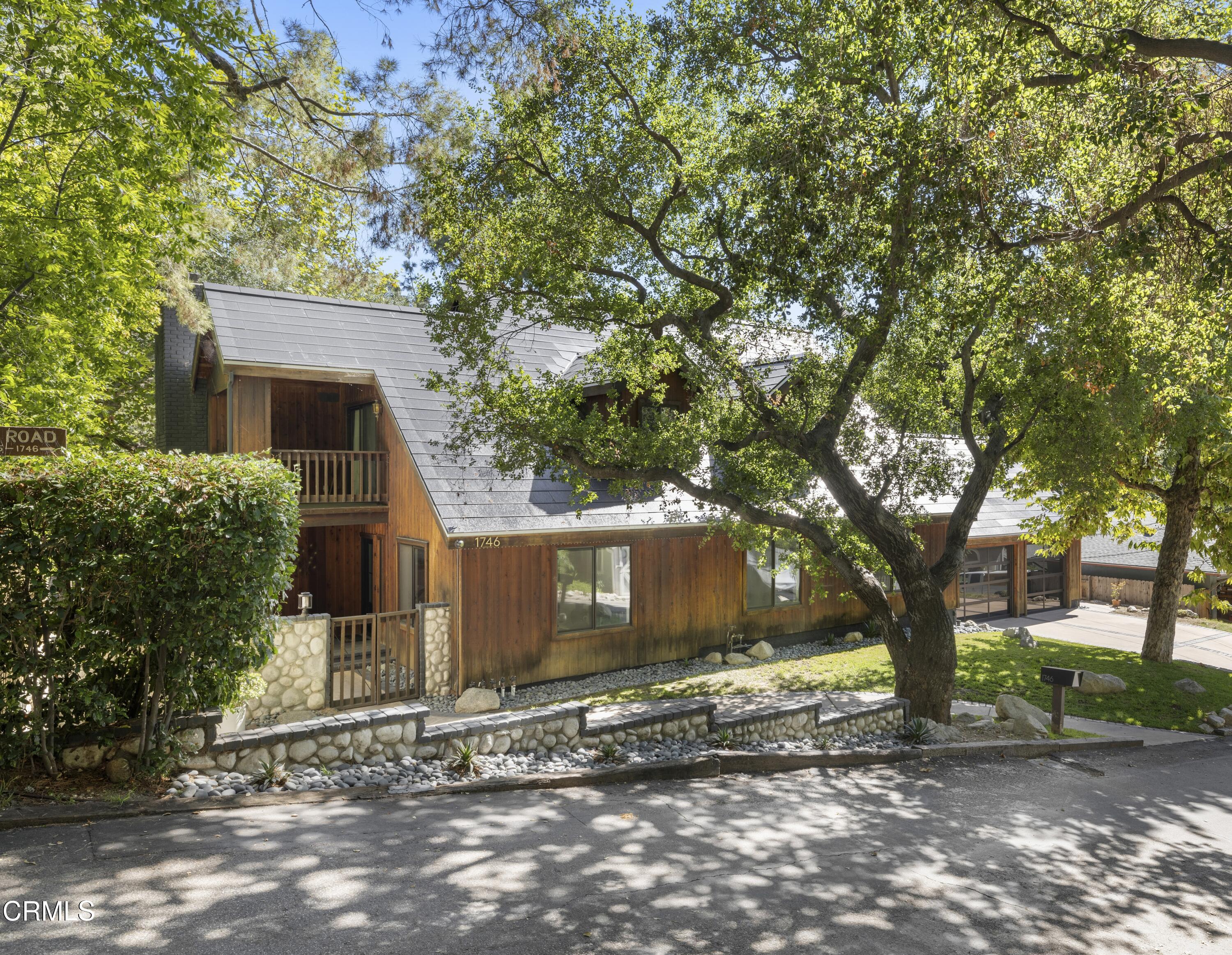 1746 Pasadena Glen Road Pasadena, CA 91107 - Photo 1 of 1 a view of a house with a yard